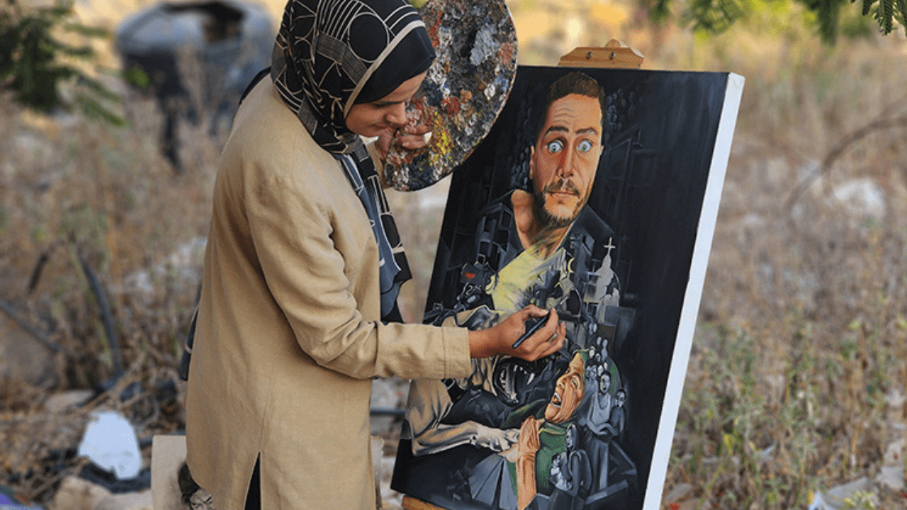 Filistinli ressam, sanatıyla Gazze'deki acı ve felaketi dünyaya duyurmaya çalışıyor - Resim : 2
